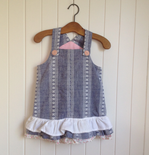 Size 2 Toddlers Summer Dress in blue and white denim stripes. Straps and three bottom frills.